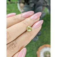 1.10 Ct. Yellowish Green Sapphire from Madagascar Life Style