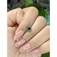 1.11 Ct. Yellowish Green Sapphire from Madagascar Life Style