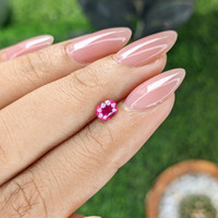 0.59 Ct. Reddish Pink Sapphire from Mozambique Life Style
