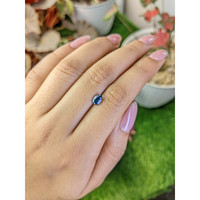 0.81 Ct. Greenish Blue Sapphire from Madagascar Life Style