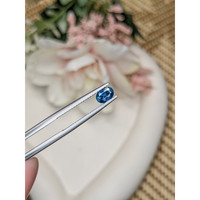 0.81 Ct. Greenish Blue Sapphire from Madagascar Life Style