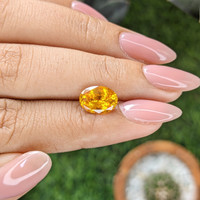 2.96 Ct. Yellowish Orange Sapphire from Ceylon (Sri Lanka) Life Style