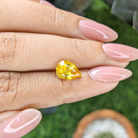 2.57 Ct. Orangish Yellow Sapphire from Ceylon (Sri Lanka) Life Style