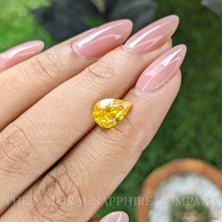 2.57 Ct. Orangish Yellow Sapphire from Ceylon (Sri Lanka)