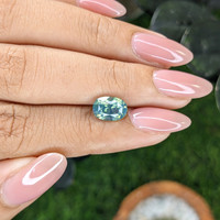 2.51 Ct. Bluish Green Sapphire from Madagascar Life Style