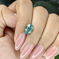 2.51 Ct. Bluish Green Sapphire from Madagascar Life Style