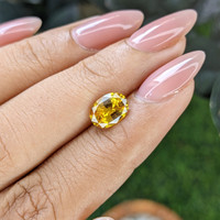 1.83 Ct. Orangish Yellow Sapphire from Ceylon (Sri Lanka) Life Style