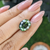 6.05 Ct. Bluish Green Sapphire from Madagascar Life Style