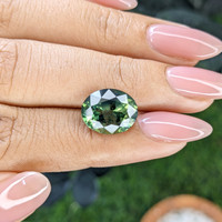 6.05 Ct. Bluish Green Sapphire from Madagascar Life Style