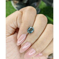 2.07 Ct. Bluish Green Sapphire from Madagascar Life Style