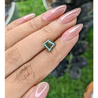 2.06 Ct. Yellowish Green Sapphire from Madagascar Life Style