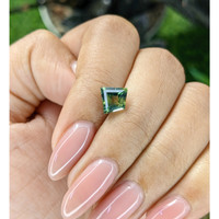 2.06 Ct. Yellowish Green Sapphire from Madagascar Life Style