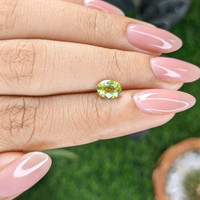 1.08 Ct. Yellowish Green Sapphire from Madagascar Life Style