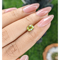 1.08 Ct. Yellowish Green Sapphire from Madagascar Life Style
