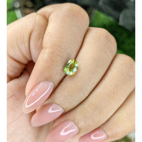 1.08 Ct. Yellowish Green Sapphire from Madagascar Life Style