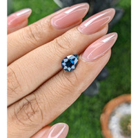 1.68 Ct. Greenish Blue Sapphire from Madagascar Life Style