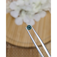 0.39 Ct. Bluish Green Sapphire from Ceylon (Sri Lanka) Life Style