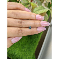 0.48 Ct. Greenish Blue Sapphire from Ceylon (Sri Lanka) Life Style