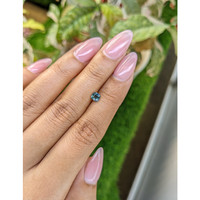 0.48 Ct. Greenish Blue Sapphire from Ceylon (Sri Lanka) Life Style