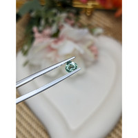 0.61 Ct. Bluish Green Sapphire from Ceylon (Sri Lanka) Life Style
