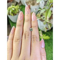 0.85 Ct. Yellowish Green Sapphire from Ceylon (Sri Lanka) Life Style