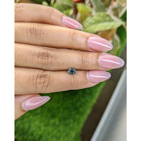 0.65 Ct. Bluish Green Sapphire from Ceylon (Sri Lanka) Life Style