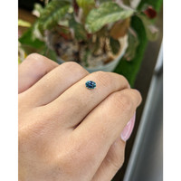 0.65 Ct. Bluish Green Sapphire from Ceylon (Sri Lanka) Life Style