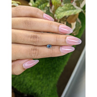 0.65 Ct. Bluish Green Sapphire from Ceylon (Sri Lanka) Life Style