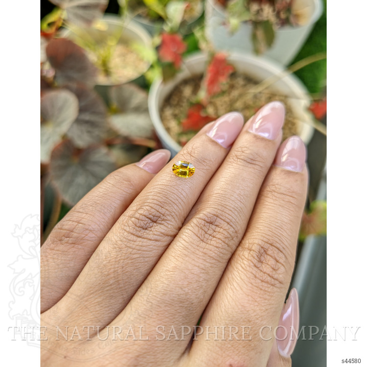 0.73 Ct. Orangish Yellow Sapphire from Ceylon (Sri Lanka)