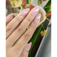 0.64 Ct. Orangish Yellow Sapphire from Ceylon (Sri Lanka) Life Style