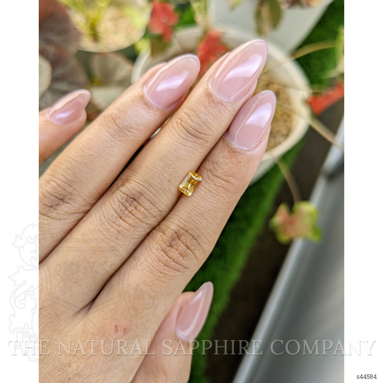 0.64 Ct. Orangish Yellow Sapphire from Ceylon (Sri Lanka)