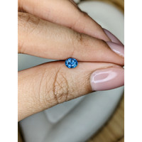 0.51 Ct. Greenish Blue Sapphire from Madagascar Life Style