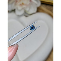 0.63 Ct. Greenish Blue Sapphire from Madagascar Life Style