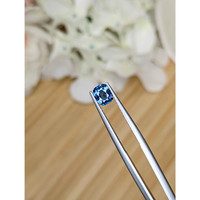 0.79 Ct. Greenish Blue Sapphire from Madagascar Life Style