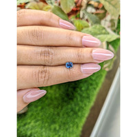 0.79 Ct. Greenish Blue Sapphire from Madagascar Life Style
