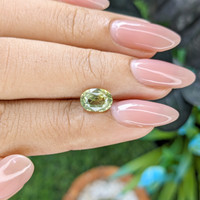 1.71 Ct. Yellowish Green Sapphire from Africa Life Style
