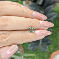 1.18 Ct. Yellowish Green Sapphire from Madagascar Life Style