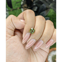 2.06 Ct. Yellowish Green Sapphire from Madagascar Life Style