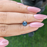 1.00 Ct. Greenish Blue Sapphire from Madagascar Life Style