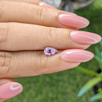 0.89 Ct. Pinkish Purple Sapphire from Madagascar Life Style