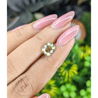 2.06 Ct. Yellowish Green Sapphire from Tanzania Life Style