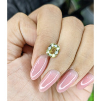 2.06 Ct. Yellowish Green Sapphire from Tanzania Life Style