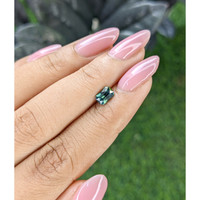 0.91 Ct. Bluish Green Sapphire from Madagascar Life Style