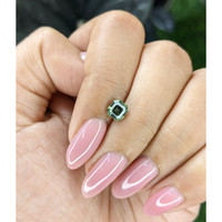 0.95 Ct. Bluish Green Sapphire from Madagascar Life Style