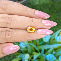 2.50 Ct. Orangish Yellow Sapphire from Tanzania Life Style