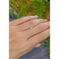 0.55 Ct. Yellowish Green Sapphire from Madagascar Life Style