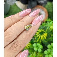 1.63 Ct. Greenish Yellow Sapphire from Madagascar Life Style