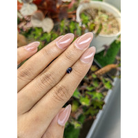 0.45 Ct. Pinkish Purple Sapphire from Ceylon (Sri Lanka) Life Style