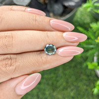 1.68 Ct. Yellowish Green Sapphire from Madagascar Life Style