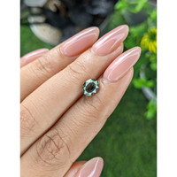 1.56 Ct. Brownish Green Sapphire from Tanzania Life Style